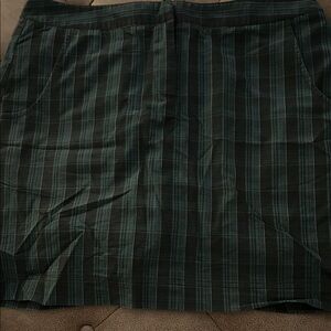 Cutter & Buck Dark Plaid golf skort with two pockets in front one in back